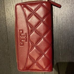 Gentle used Wallet; wine/ burgundy color.